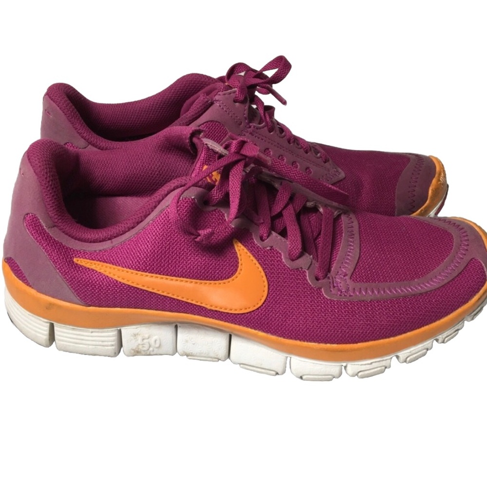 Nike pink and orange running sneakers. Size 8.